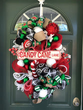 Load image into Gallery viewer, Custom designer handmade Christmas Candy Cane Lane Wreath